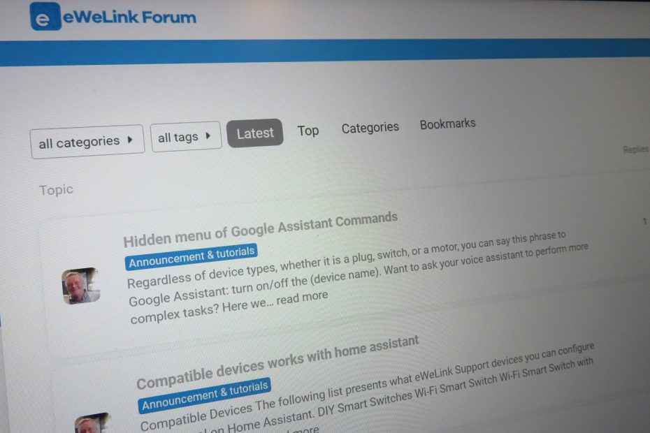 Photo of eWeLink forum on a notebook screen